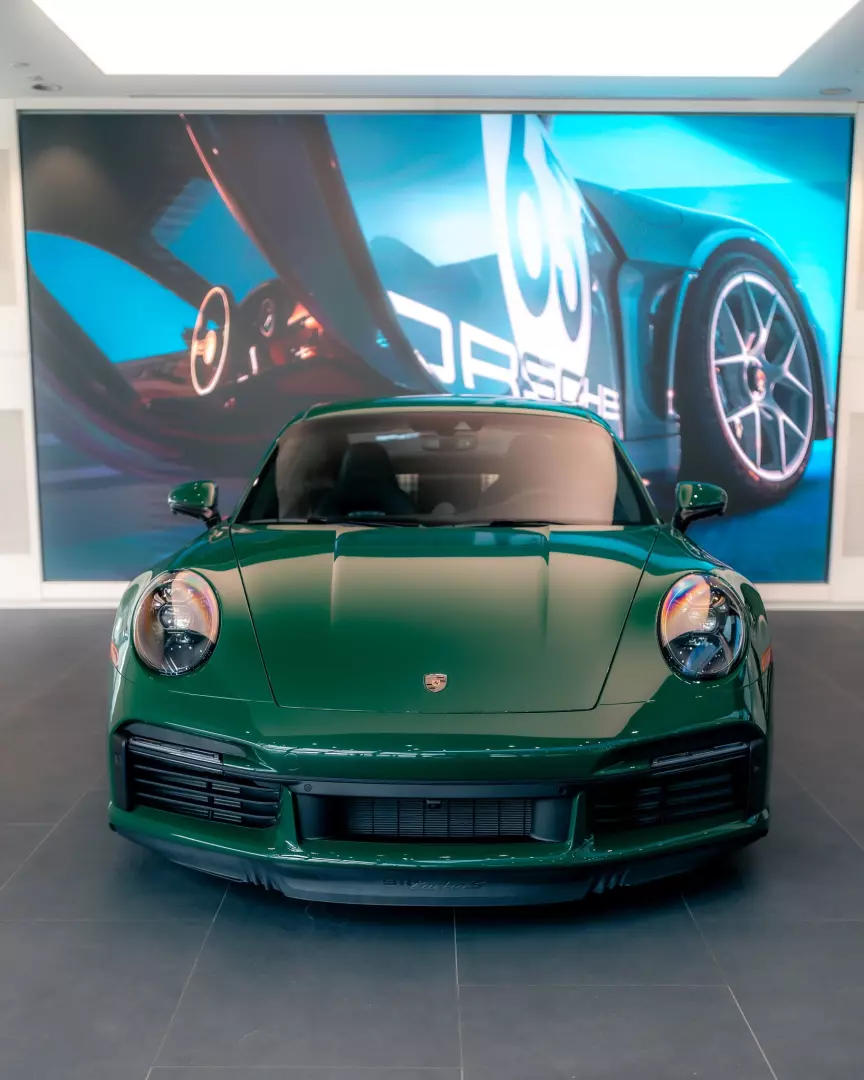 Porsche 911 Turbo 50 Years Edition (992) painted in British Racing Green