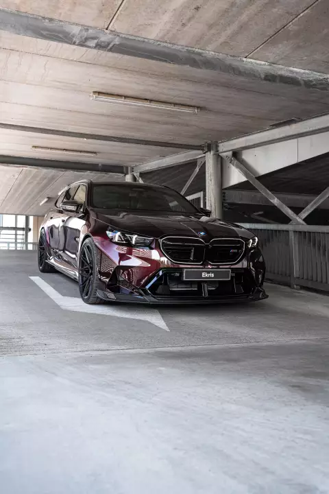 BMW M5 Touring (G99) painted in Madeira Red