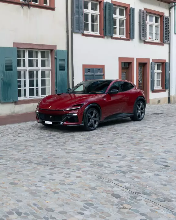 Ferrari Purosangue painted in Rosso GP 1000