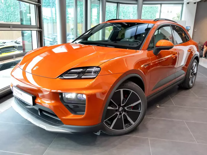 Porsche Macan Electric painted in Papaya Metallic