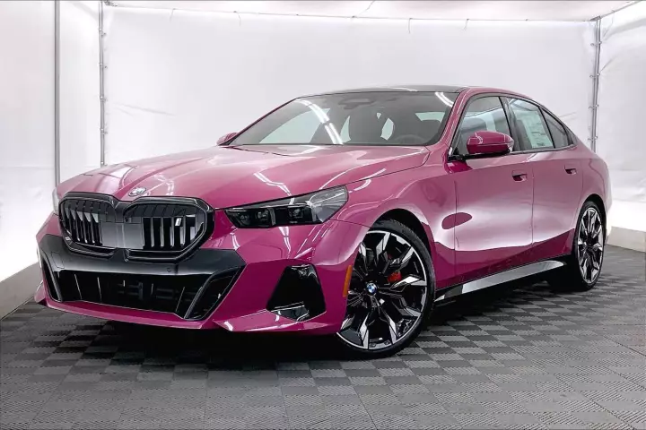 BMW i5 (G60) painted in Ruby Star Neo