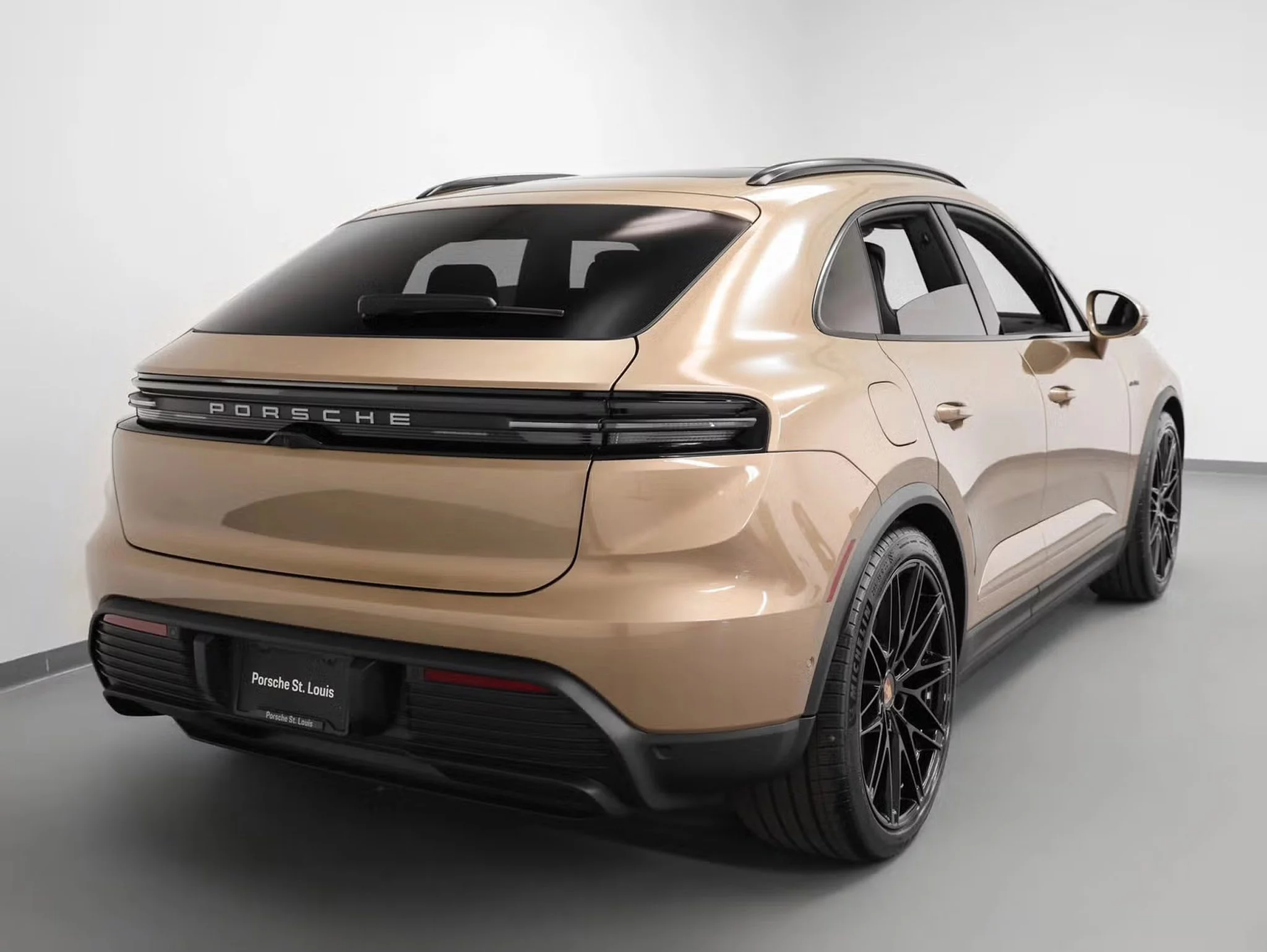 Gold Bronze Metallic Porsche Macan Electric