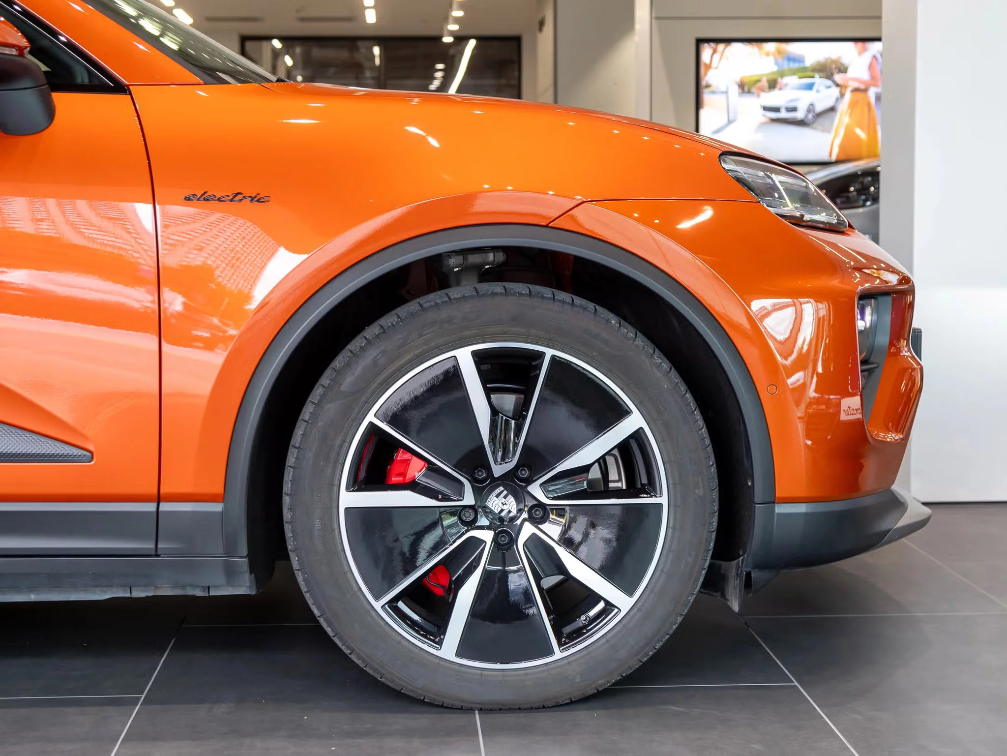 Papaya Metallic Porsche Macan Electric