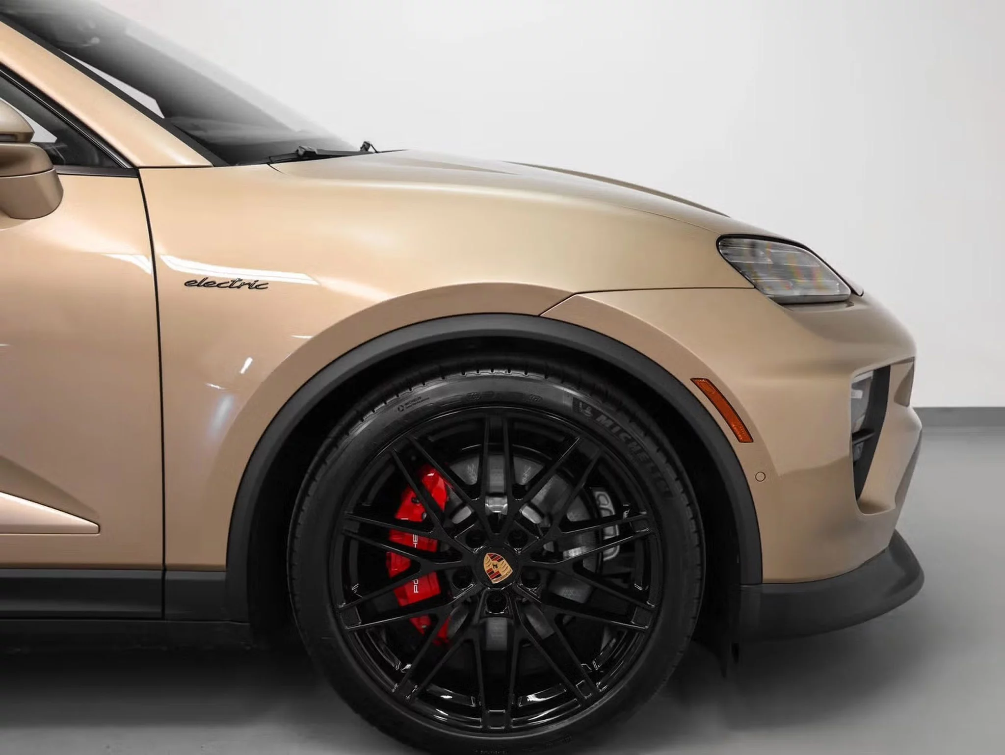 Gold Bronze Metallic Porsche Macan Electric