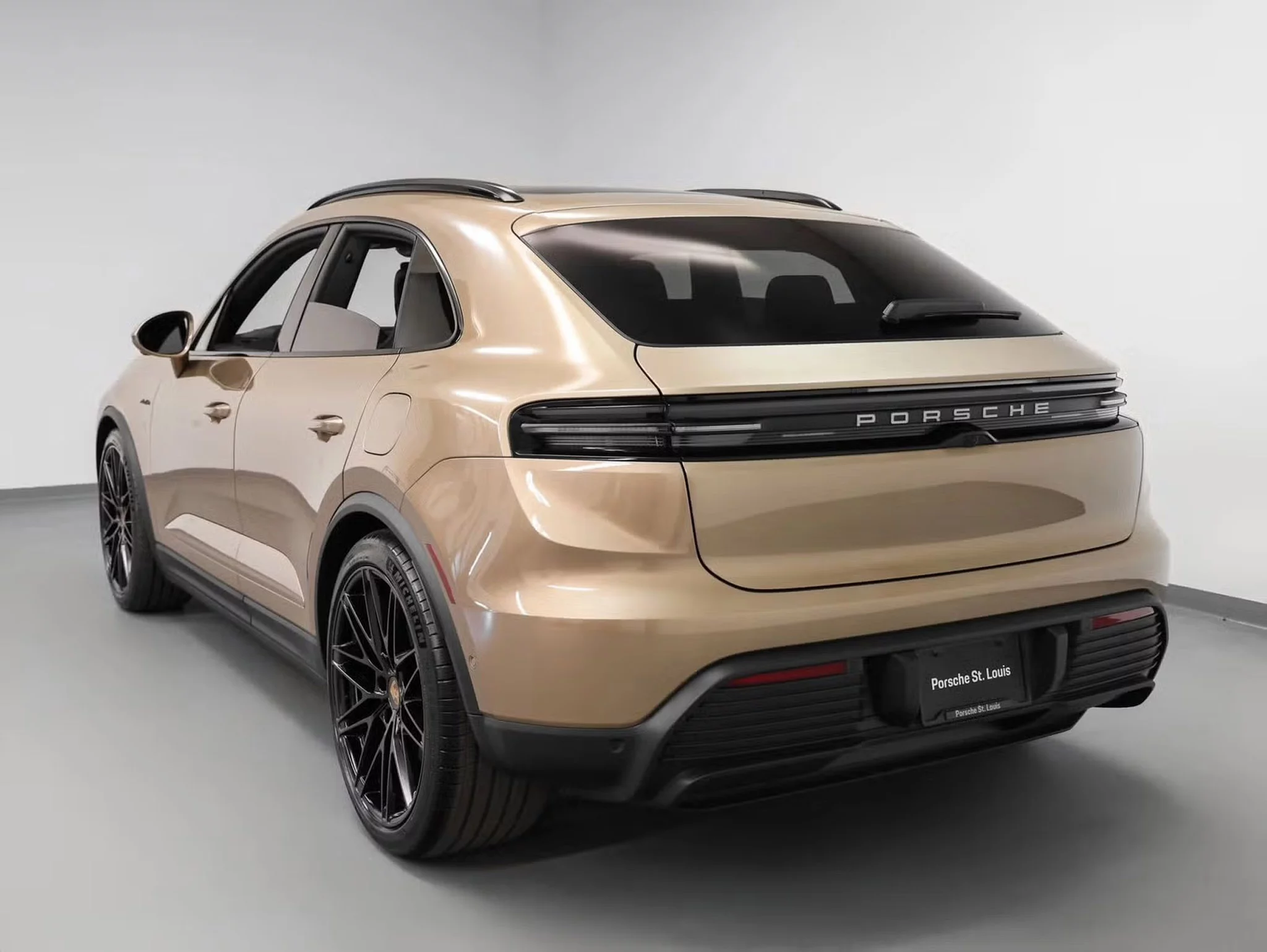 Gold Bronze Metallic Porsche Macan Electric